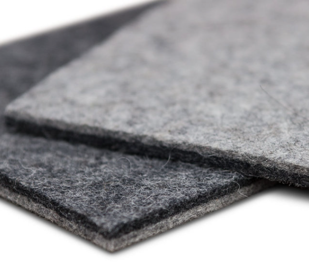 Stack of grey wool felt square coasters